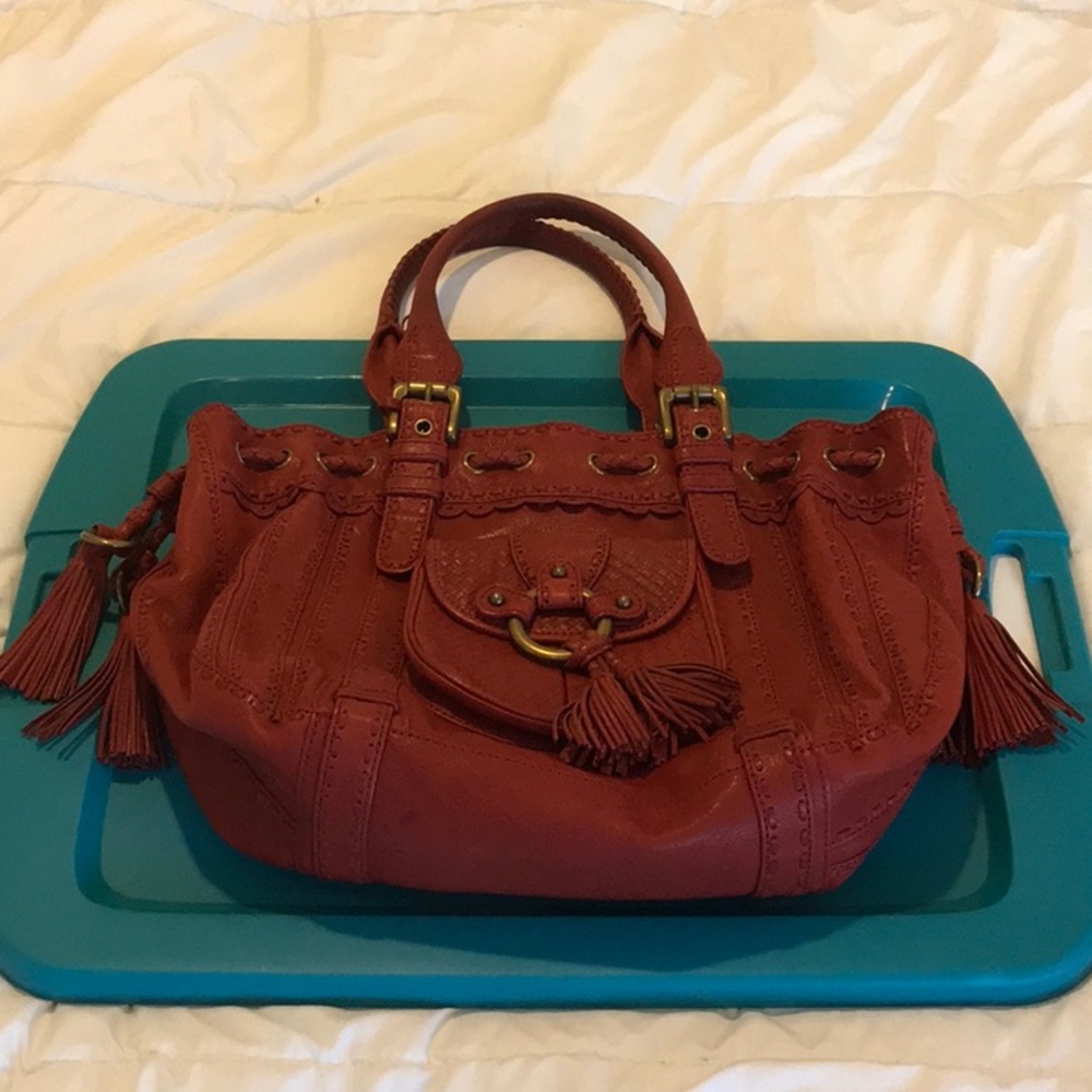 Red purse by Lockheart